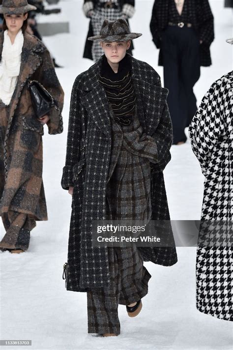 Maike Inga walks the runway during the Chanel show as part of 